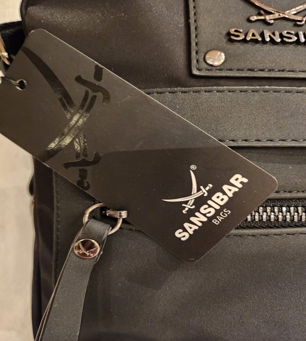 09 Punten.... Sansibar Crossbody SB-2705