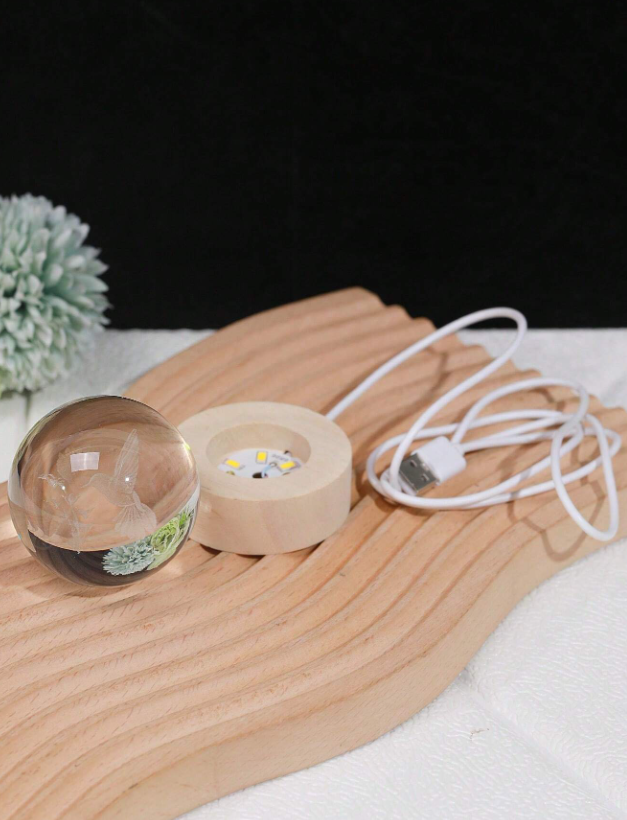 Kristallen bol met vliegende Kolibrie