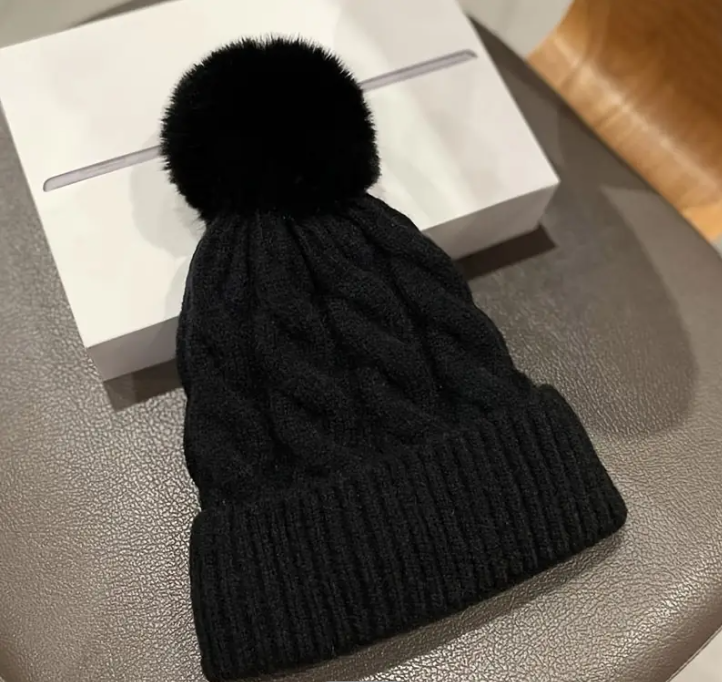 36 Punten.... Zwarte wollen warme muts