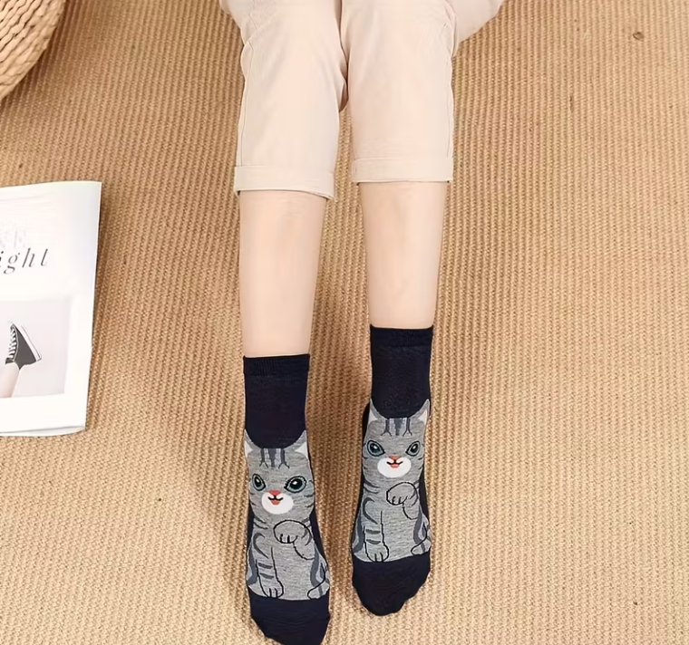 Willekeurig paar cartoon katte-sokken
