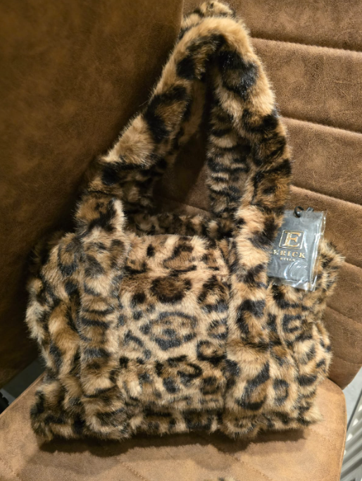 Super leuke fluffy tas donker panter kleur