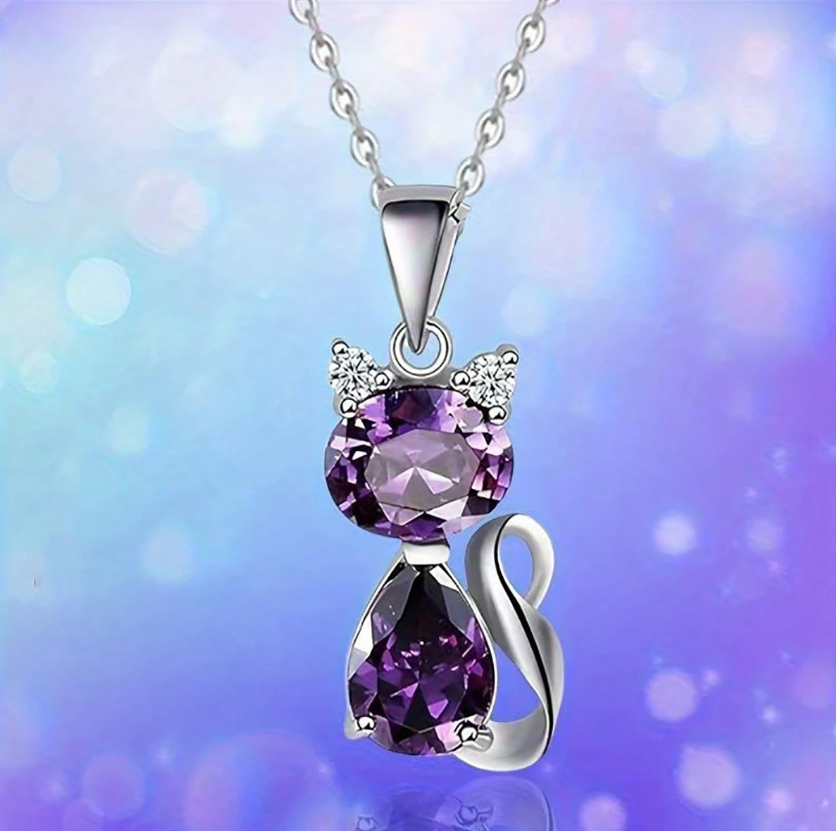 20 Punten.... Ketting met een Kat gelegd in paarse kristallen