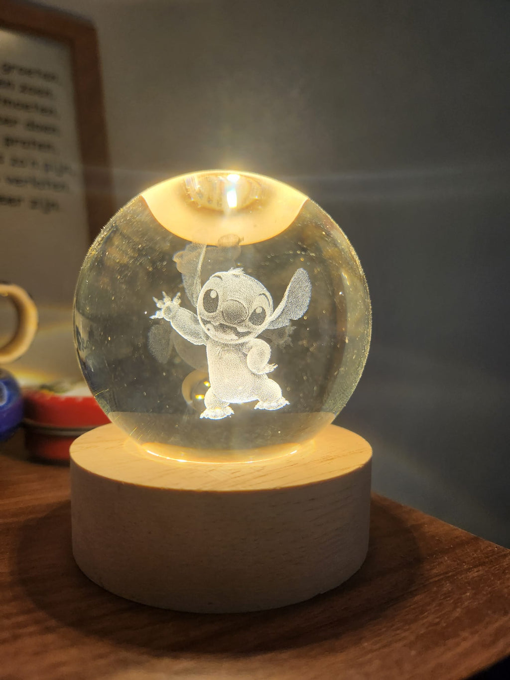 64 Punten.... Kristallen bol met vrolijke Stitch